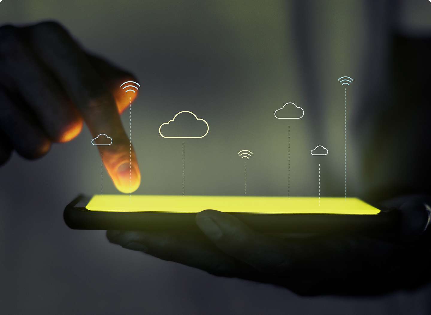 A person using a digital tablet with glowing cloud icons representing cloud computing and data storage, symbolizing Amazon Web Services (AWS) solutions and technology.