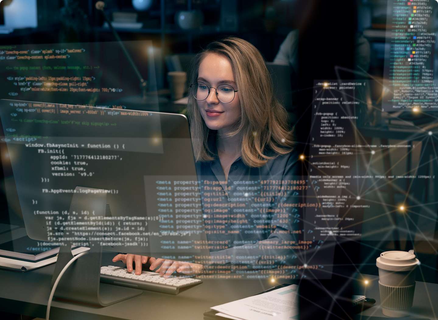 A web developer working on computer code in a modern office environment, representing a professional Web Development Company in Kerala specializing in innovative website design and development solutions.