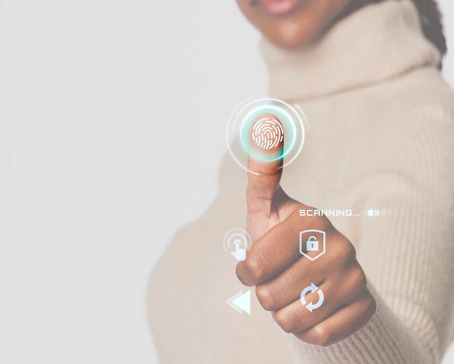 Person using fingerprint scanning technology for secure access control developed by a software solutions company.