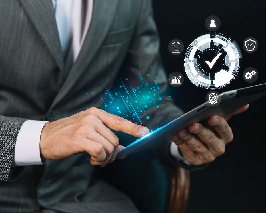 Business professional using a digital tablet to manage schedules through an employee shift management system.